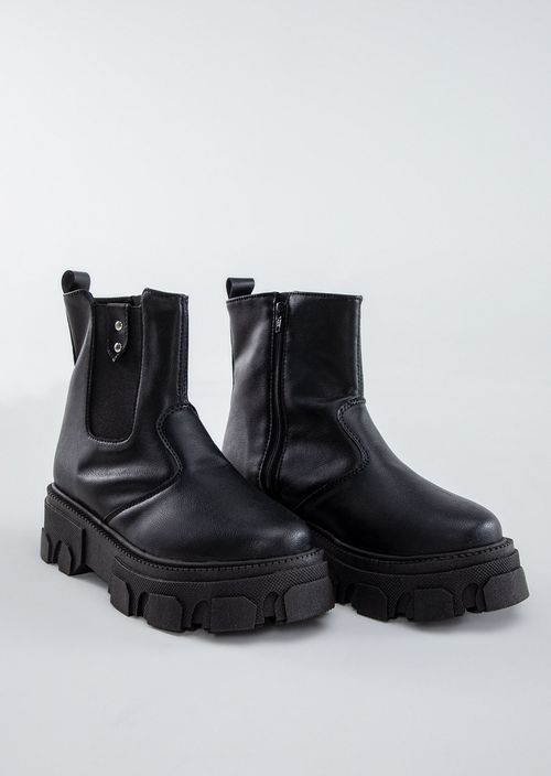 Botas negras de suela alta para adolescentes