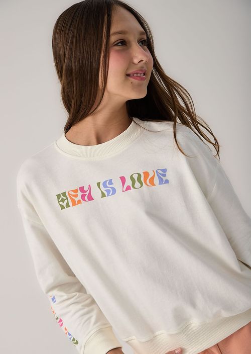 Buzo marfil frente y manga estampada para niñas
