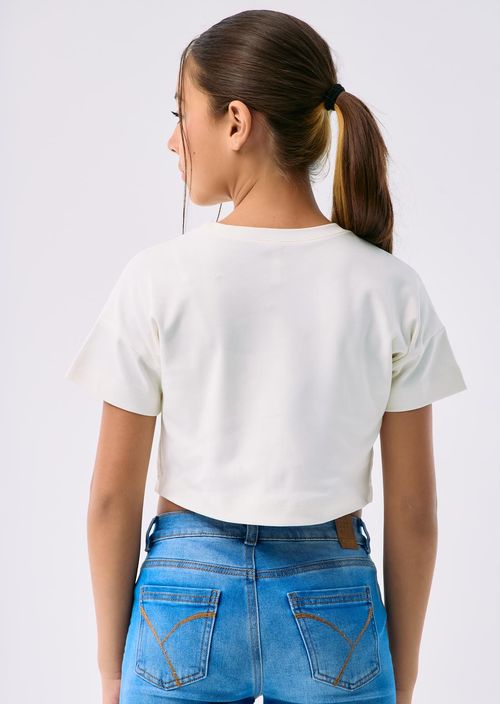 Camiseta marfil con corte en frente para niñas