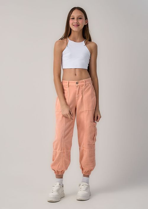 Jogger mandarina con bolsillos en costados para niñas