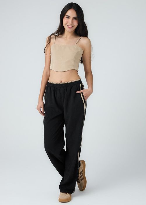 Pantalón negro con sesgos decorativos para adolescentes
