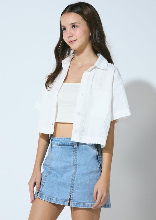 Blusa marfil frente con bolsillo para jóvenes
