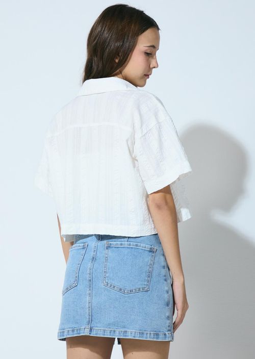 Blusa marfil frente con bolsillo para jóvenes